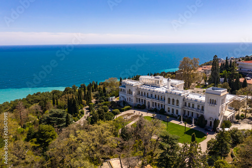 Aerial drone shot of Livadia Palace with a beautiful landscaped garden in Crimea