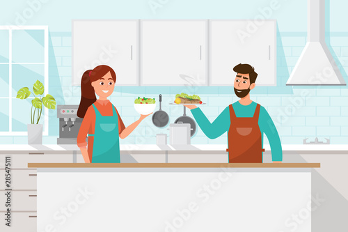 Husband and wife cooking together. Man and woman in the kitchen