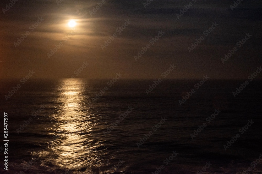 Moon over the ocean in south africa