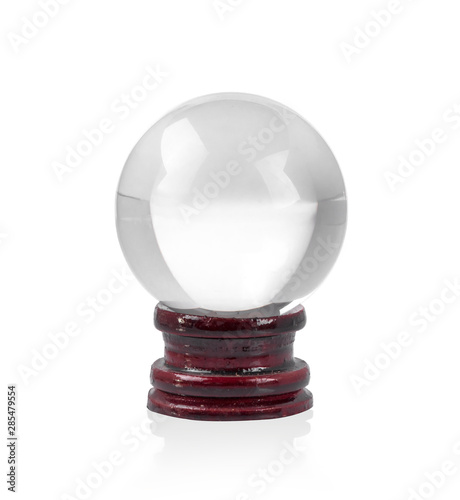 Religious round glass balls placed on a wooden platform or crystal ball isolated on white background.