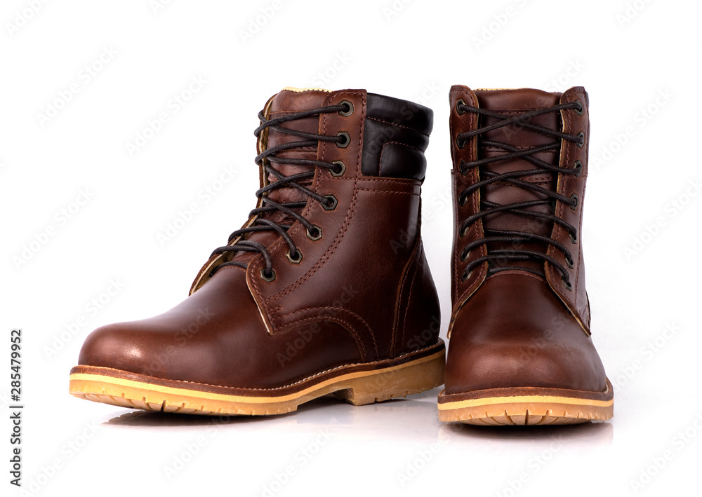 Man fashion brown boot leather isolated on a white background. Man fashion brown boot leather isolated on a white background.