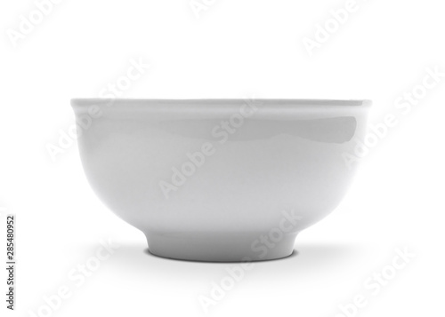 White bowl on white background. Side view of ceramic object .