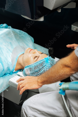 Nice young woman being ready for the operation