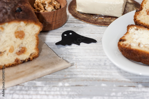 Barmbrack or bairin breac is a traditional Irish sweet yeast bread with grapes and raisins, often eaten with afternoon tea butter and traditionally served on Halloween. photo