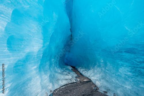 Glacial ice details as seen from inside a cave
