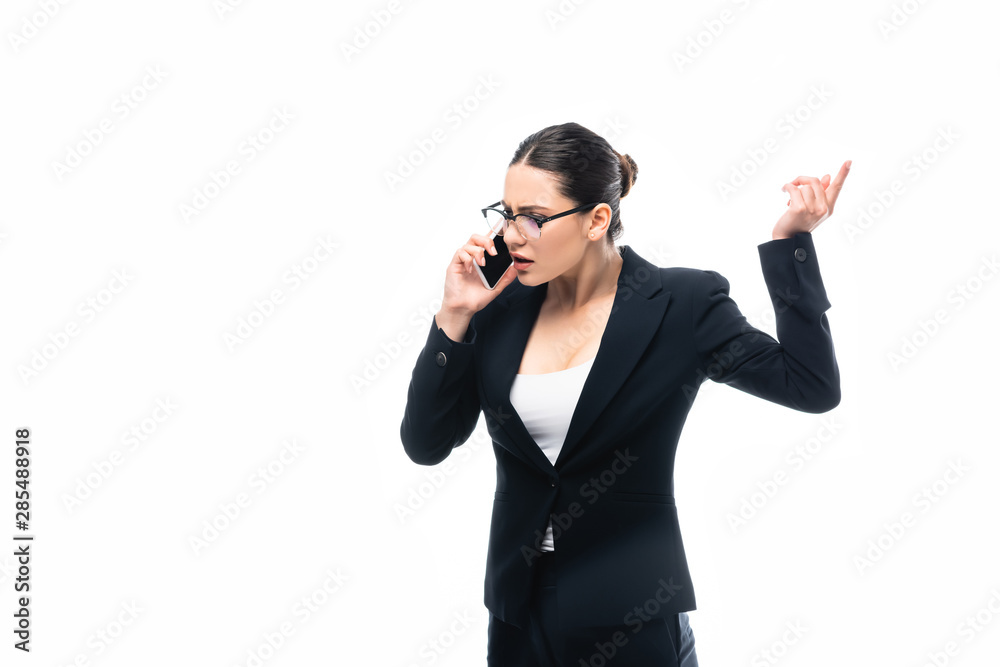 displeased businesswoman gesturing while talking on smartphone isolated on white displeased businesswoman gesturing while talking on smartphone isolated on white