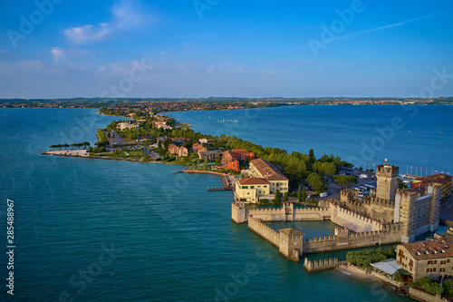 Aerial photography with drone, Scaligero Castle lake Garda, Sirmione del Garda, Italy.