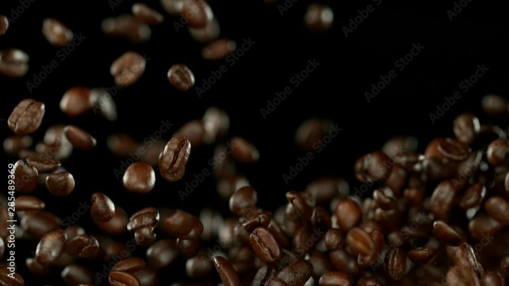 Super slow motion of flying coffee beans. Filmed on high speed cinema camera, 1000 fps. Super slow motion of flying coffee beans. Filmed on high speed cinema camera, 1000 fps.