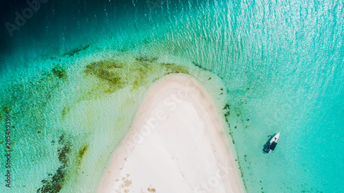 Caribbean: Vacation in the blue sea and deserted islands. Aerial view of a blue sea with crystal water. Great landscape. Beach scene. Aerial View Island Landscape Los Roques