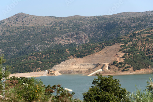 Crete, Greece. June 2019.  Industrial work being carried out to form a dam at the edge of the Aposelemis Dam in central Crete. photo