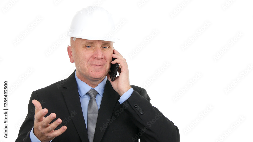 Image with Businessman Wearing Helmet and Talking to Cellphone Image with Businessman Wearing Helmet and Talking to Cellphone