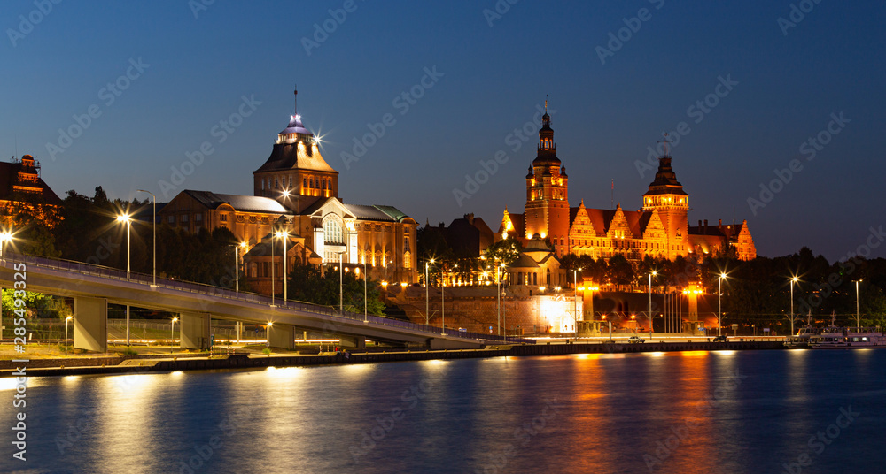 Szczecin. Night view from across the river to the illuminated historic center.