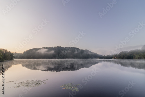 Sunrise above foggy lake © Levin