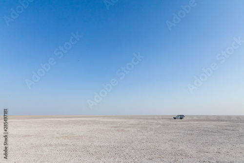 Driving on Makgadikgadi Pans in Botswana photo