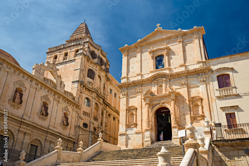 Scenic entrance stairway and façade of the baroque church of S. Francesco d'Assisi and Monastery of S. Salvatore in Noto, Sicily Italy.
