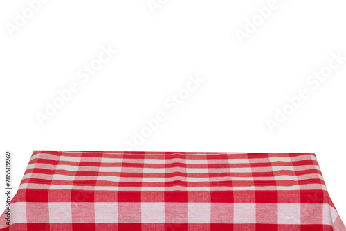 Empty table background. Empty wooden deck table covered with red white checkered tablecloth isolated on a white background. Space for your food and product display montage.