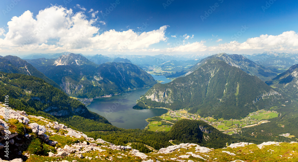 Aerial view of Alps mountain valley with beautiful lake and peaks