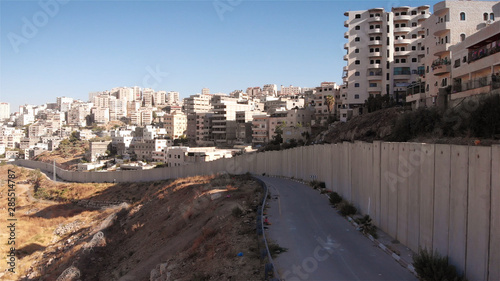 Fototapeta Naklejka Na Ścianę i Meble -  Concrete security fence in Jerusalem aerial
