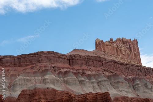 Capitol Reef National Park low angle landscape of purple and pink barren stone hillside