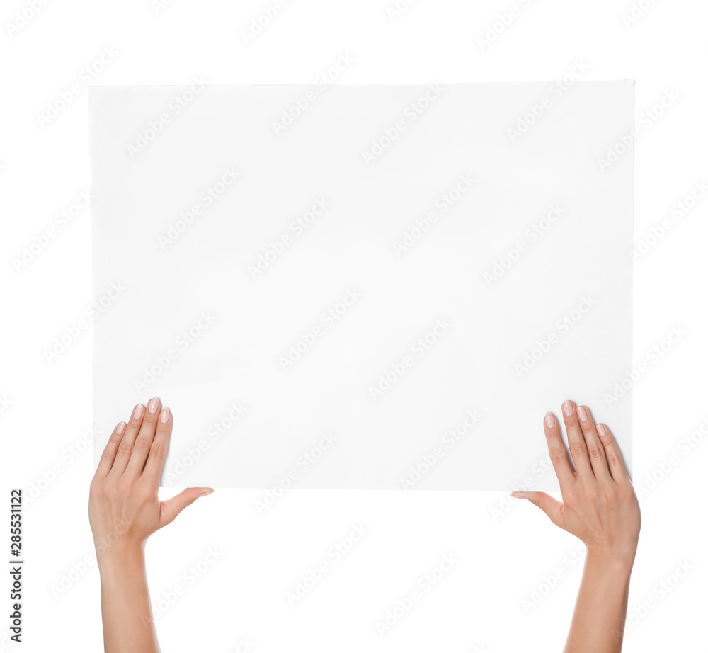Female hands with blank poster on white background Female hands with blank poster on white background