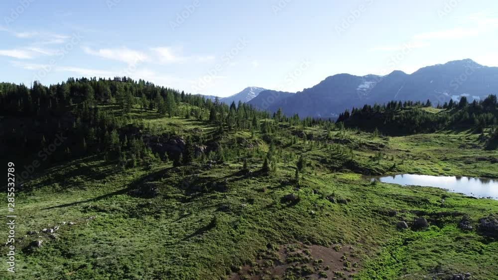 Wide aerial, remote mountains in British Columbia Wide aerial, remote mountains in British Columbia