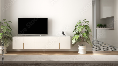Wooden vintage table top or shelf closeup  zen mood  over contemporary minimalist white and wooden living room with tv cabinet  white architecture interior design