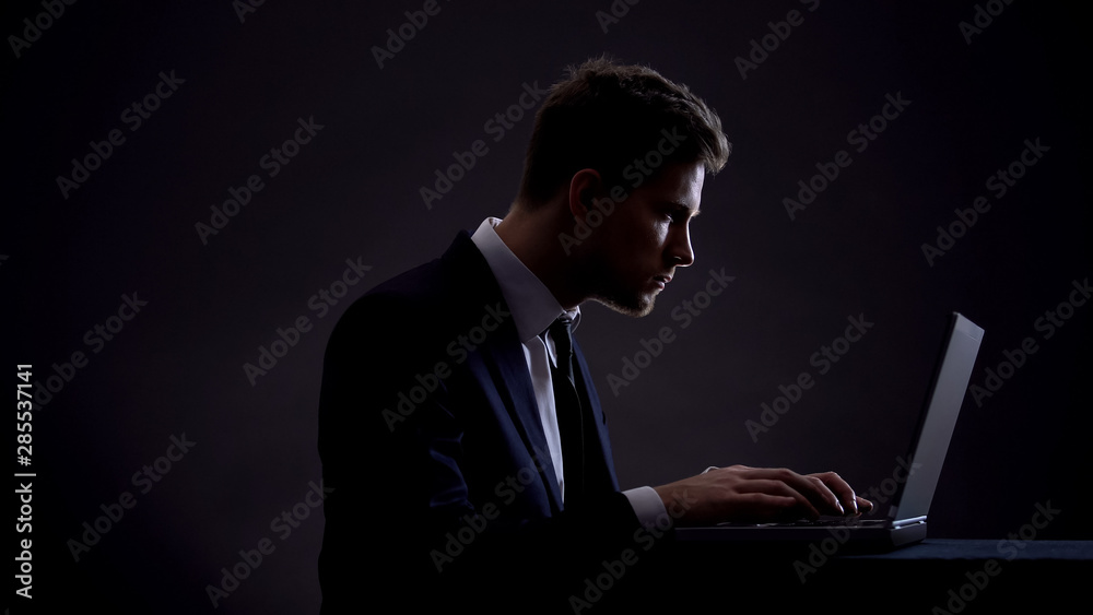 Businessman typing on computer, vision problems, wrong sitting position, health Businessman typing on computer, vision problems, wrong sitting position, health