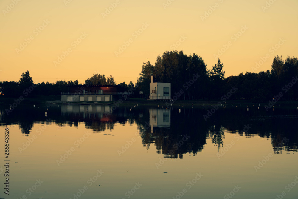 Buildings, at river cost, late evening, Sesupes river Buildings, at river cost, late evening, Sesupes river