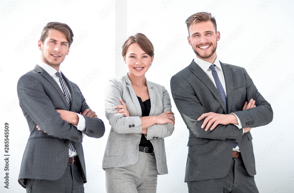 portrait of a group of successful youngsters on a light background. portrait of a group of successful youngsters on a light background.