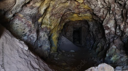 Point of view of walking into an old mine photo