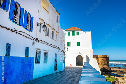 Beautiful view of street with typical arabic architecture. Location: Asilah, North Morocco, Africa. Artistic picture. Beauty world