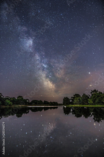 WIDE EXPANSE OF STARS OVER LAKE photo