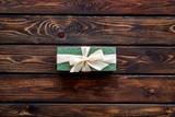 box for gifts on wooden background top view mock up