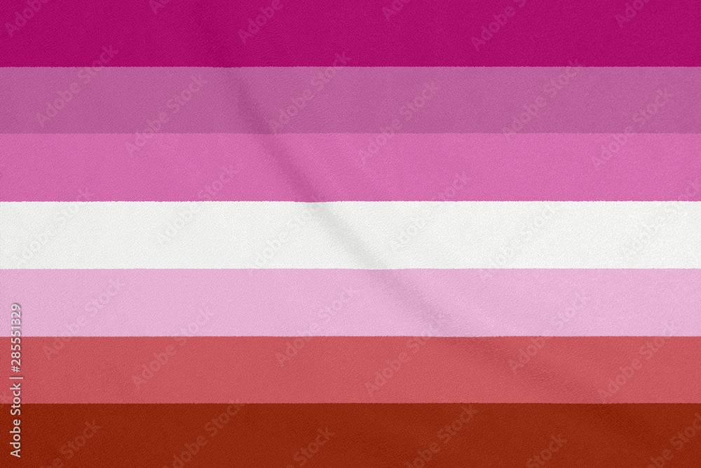 LGBT lesbian community flag on a textured fabric. Pride symbol