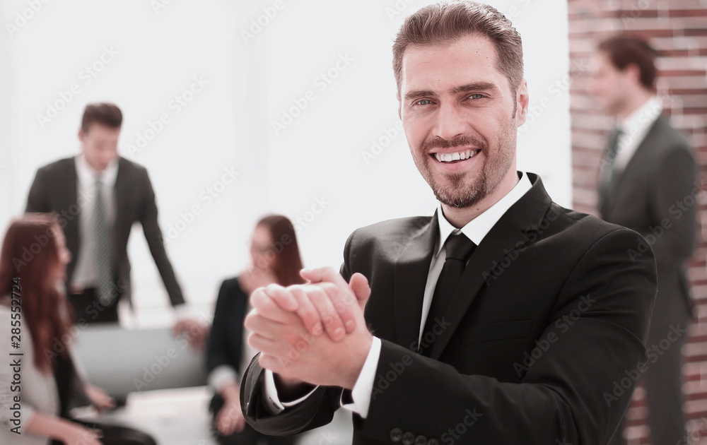 Portrait of a businessman, welcoming in the office Portrait of a businessman, welcoming in the office