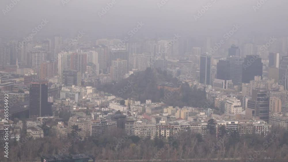 View of Santa Lucia hill and downtown Santiago, Chile with high levels of air pollution View of Santa Lucia hill and downtown Santiago, Chile with high levels of air pollution