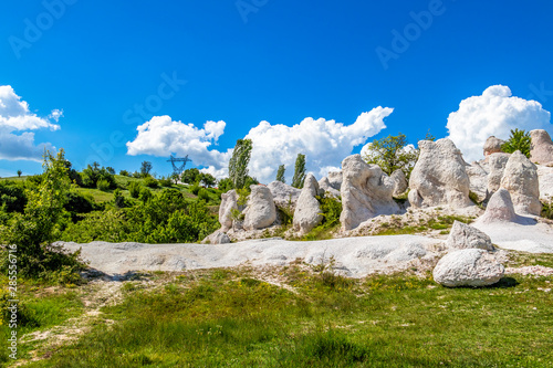 Scenic sunlit view of the natural phenomenon Kamenna Svatba or The Stone Wedding near the village of Zimzelen, Bulgaria © Stanislava