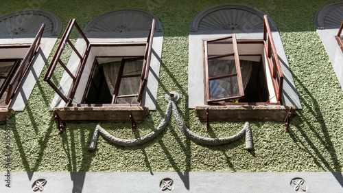 Open windows, historical house in Czech Krumlov, South Bohemia, Czech Republic