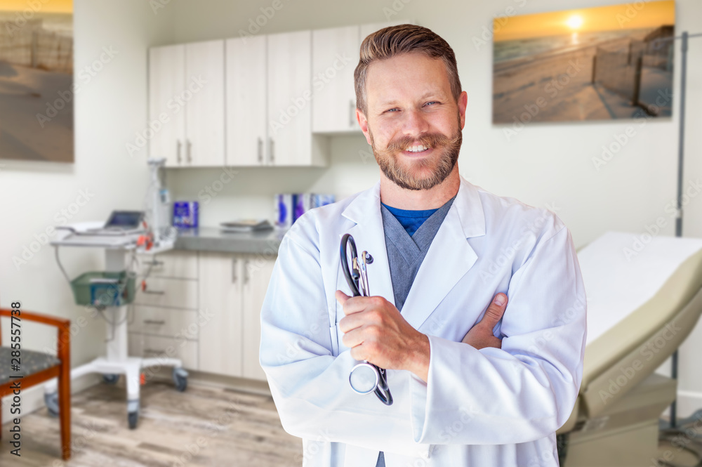 Caucasian Male Doctor Standing In Office Caucasian Male Doctor Standing In Office