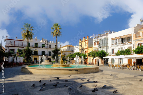 SANLUCAR OF BARRAMEDA, SPAIN-september 2018 - Town library building with a clock tower in the Plaza del Cabildo, Sanlucar de Barrameda, Cadiz Province, Andalusia, Spain, Europe