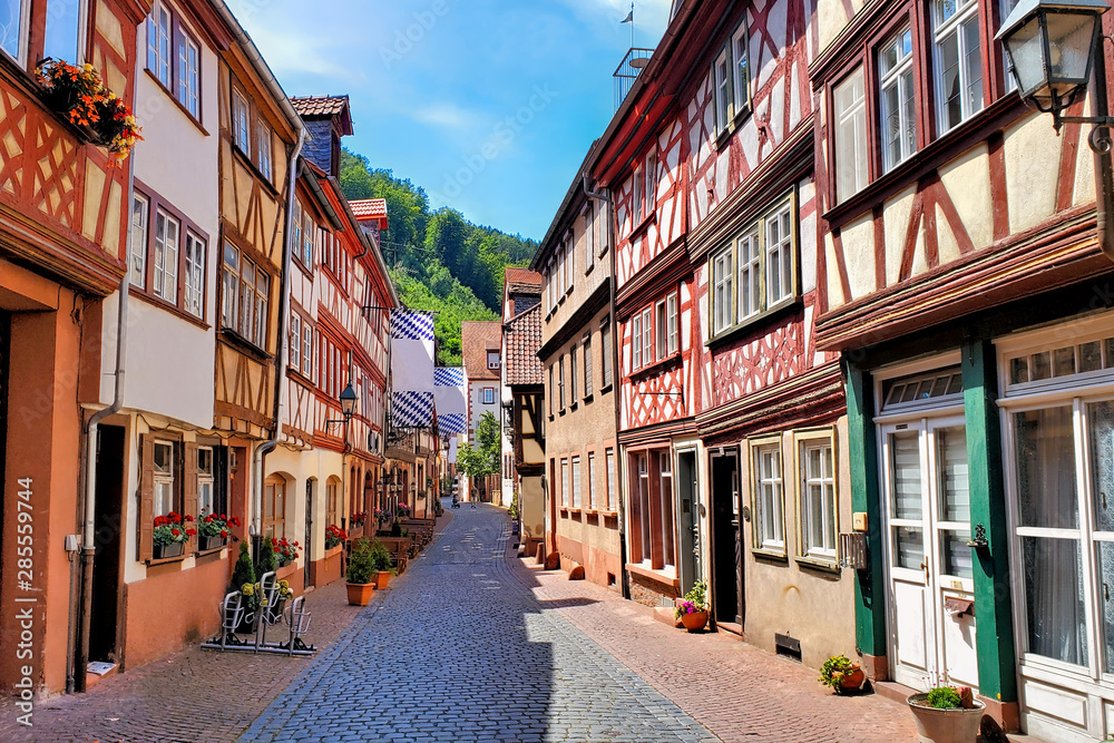 Beautiful traditional half timbered buildings along a street in the town of Miltenberg, Bavaria, Germany