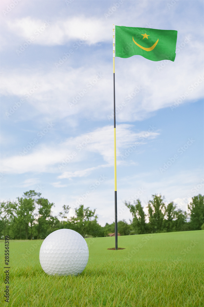 Obraz premium Mauritania flag on golf course putting green with a ball near the hole
