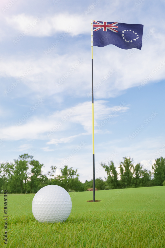 Obraz premium Cook Islands flag on golf course putting green with a ball near the hole