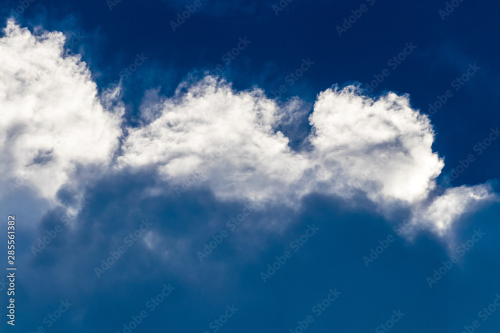 Heavy clouds with clear blue sky before storm Heavy clouds with clear blue sky before storm