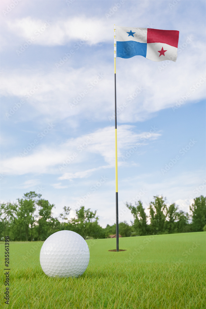 Obraz premium Panama flag on golf course putting green with a ball near the hole