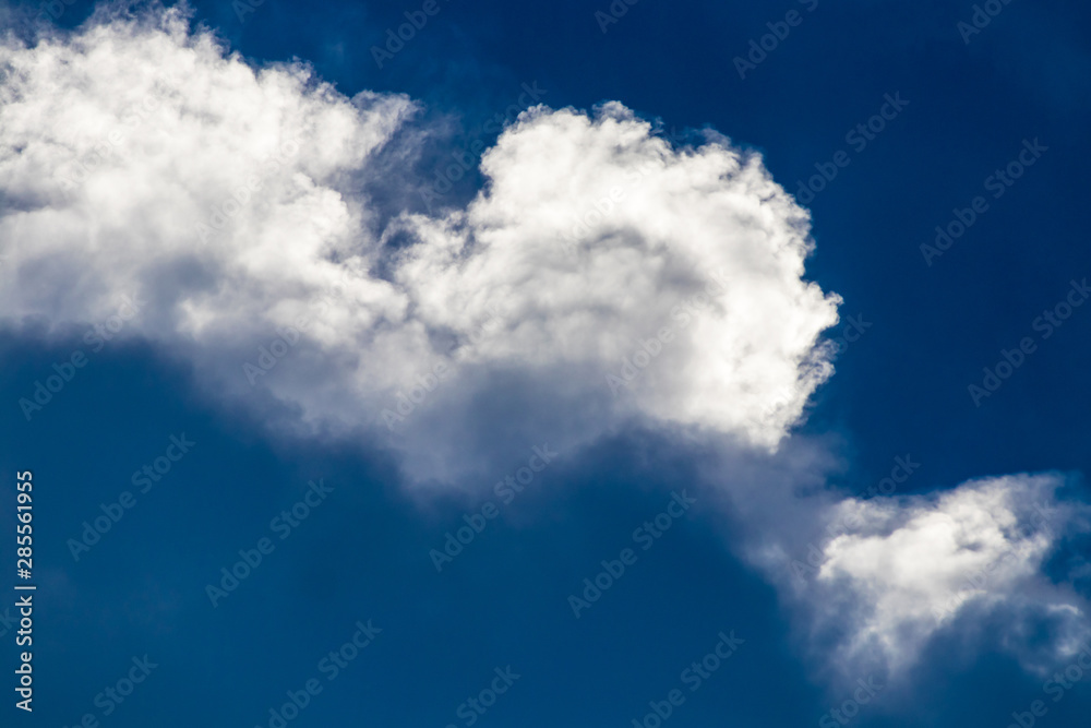 Heavy clouds with clear blue sky before storm