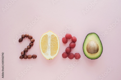 2020 made from healthy food on pastel pink  background, Healhty New year resolution diet and lifestyle