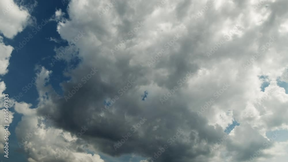 Cloud breaks down revealing blue sky Cloud breaks down revealing blue sky