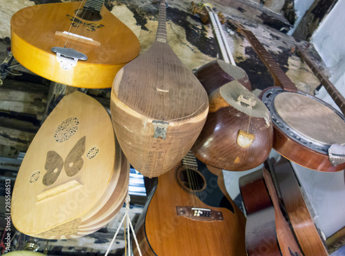 Musical intruments in repair shop, Rome, 2019.