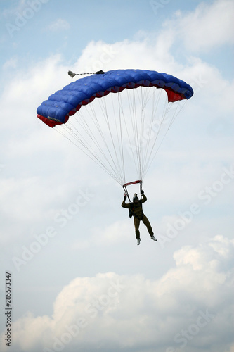 Parachutists jumping athletes
